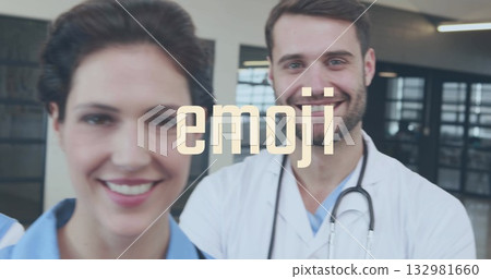 Smiling medical team standing in hospital corridor, with scrubs, white coat, stethoscope, badge 132981660