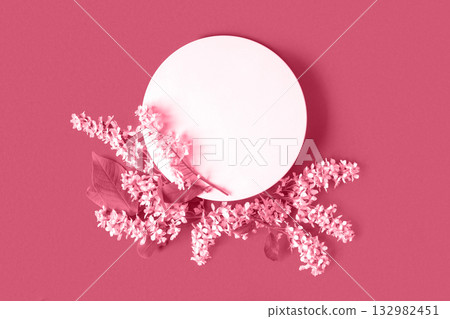 Podium for product presentation. Abstract minimal geometrical form on Viva Magenta background. One stone form, white flowers, soft shadow. Scene, Showcase, display. Minimal design. Top view, Flat lay. Podium for product presentation. Abstract minimal geometrical form on Viva Magenta background. One stone form, white flowers, soft shadow. Scene, Showcase, display. Minimal design. Top view, Flat lay. 132982451