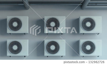 Multiple air conditioning units mounted on a wall in a modern industrial setting Multiple air conditioning units mounted on a wall in a modern industrial setting 132982726