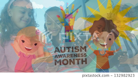 Smiling school kids using tablets in classroom with puzzle hand and Autism Awareness Month banner 132982923