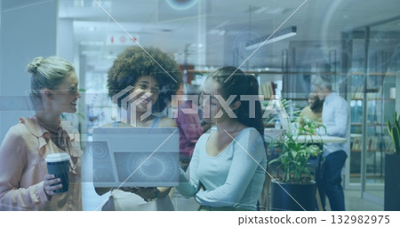 Collaborating trio of women analyzing holographic laptop interface in coworking space, coffee cup Collaborating trio of women analyzing holographic laptop interface in coworking space, coffee cup 132982975