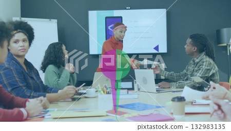 Handing document mid adult woman wearing orange sweater at meeting table, with laptops notebooks 132983135