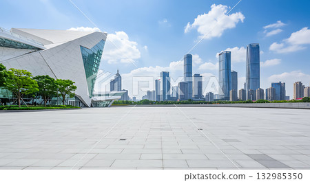 Modern architecture building with glass facade and city skyline background contemporary building 132985350