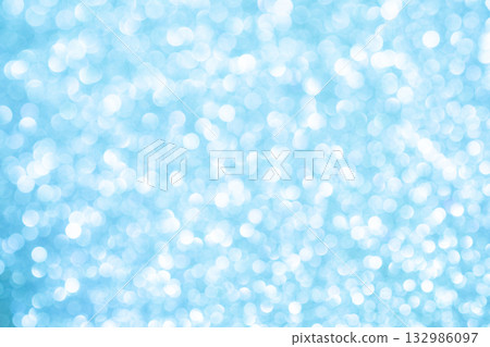 Light blue colored large and small bokeh glitter background material Light blue colored large and small bokeh glitter background material 132986097