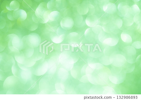 Light green colored large and small bokeh glitter background material Light green colored large and small bokeh glitter background material 132986893