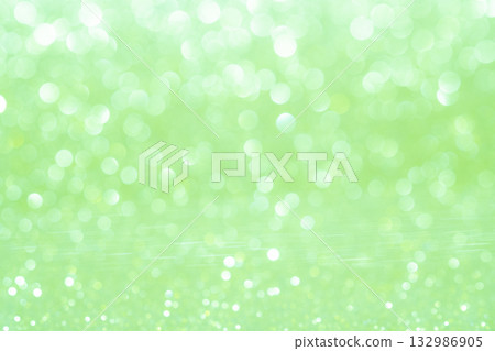 Light green colored large and small bokeh glitter background material Light green colored large and small bokeh glitter background material 132986905