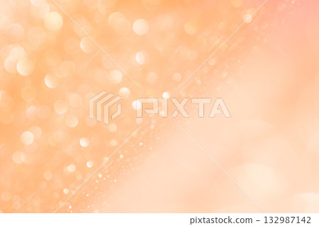 Light orange colored bokeh glitter background material 132987142