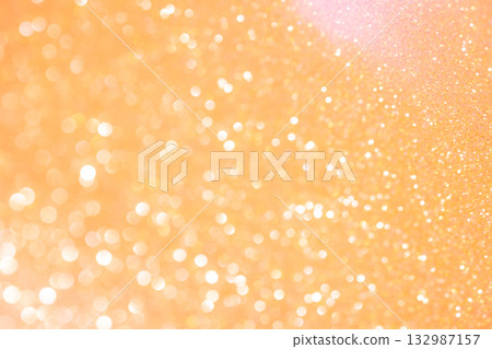 Light orange colored bokeh glitter background material 132987157