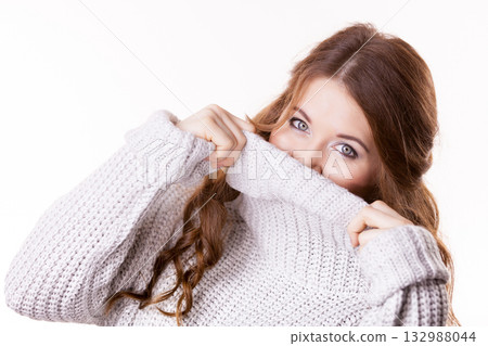Woman feeling comfortable wearing soft sweater Woman feeling comfortable wearing soft sweater 132988044