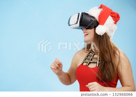 Girl watching 3d film tour in virtual reality glasses. 132988066