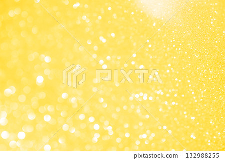Light yellow colored large and small bokeh glitter background material 132988255