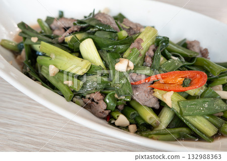 Stir-fried beef with scallions, green onions, leeks, beef. Stir-fried beef with scallions, green onions, leeks, beef. 132988363