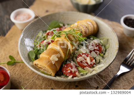 Roll omelette stuffed with chesse Roll omelette stuffed with chesse 132989004