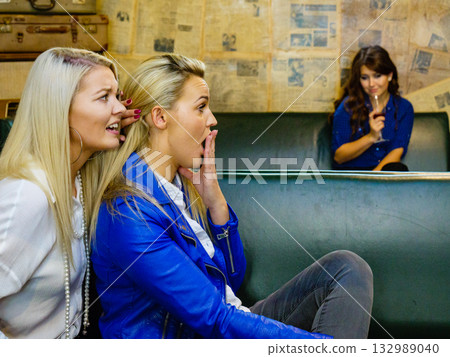 Women gossiping about friend 132989040
