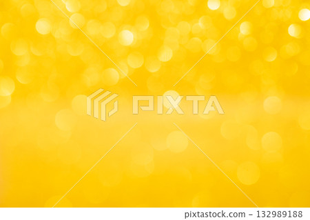 Yellow colored large and small sparkling background material Yellow colored large and small sparkling background material 132989188