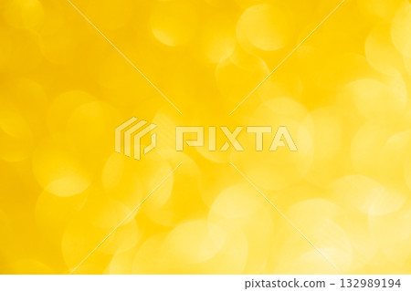 Yellow colored large and small sparkling background material 132989194