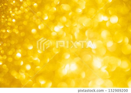 Yellow colored large and small sparkling background material 132989200