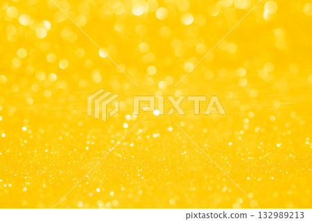 Yellow colored large and small sparkling background material 132989213