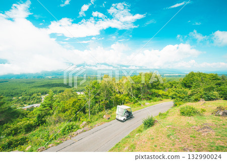 A cart running under a magnificent blue sky 132990024