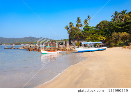 Boats at the Palolem Beach in Goa, India Boats at the Palolem Beach in Goa, India 132990259