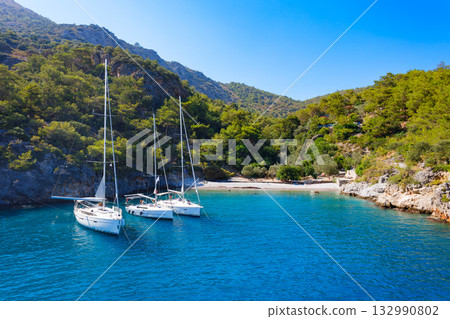 Yachts at the Cold Water Bay near Oludeniz village, Fethiye district in Turkey 132990802