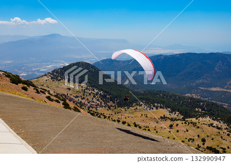 Flying paraglider at Babadag mountain in Turkey 132990947