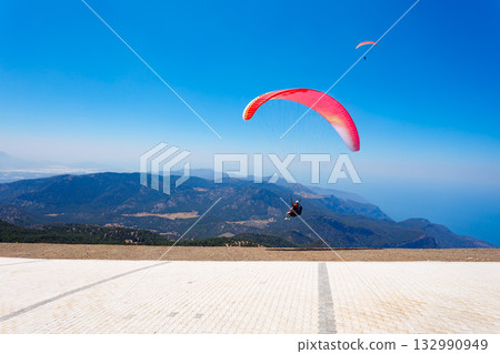 Flying paraglider at Babadag mountain in Turkey 132990949