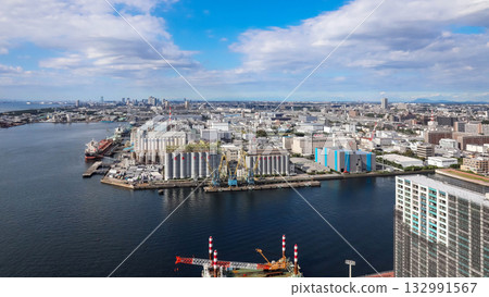 A view of Chiba Port with blue skies and white silos 132991567