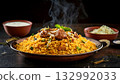 Pakistan food, Plate of steaming biryani with aromatic spices and tender meat, served with raita 132992033