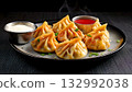 India Street Food, Steaming hot plate of momos with red chili sauce and a side of mayonnaise 132992038