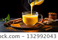 Food for cancer patients, Turmeric-infused herbal tea being poured into a cup 132992043