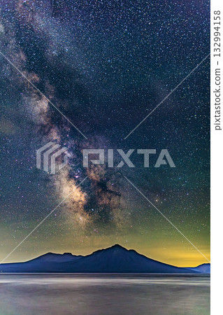 The Milky Way over Lake Shikotsu and Mount Fuppushi at night 132994158
