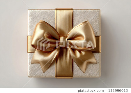 Elegant present. Gold box wrapped with a bow on white background. Jewelry, birthdays, Christmas and luxury branding. 132996013