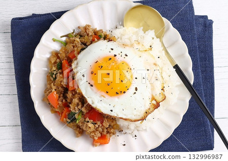 Gapao rice topped with egg Gapao rice topped with egg 132996987