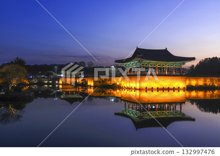 The pavilions of Anapji pond lit up as evening comes on in Gyeongju, Korea. 132997476