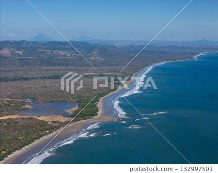 Nicaragua ocean coastline with volcano background Nicaragua ocean coastline with volcano background 132997501