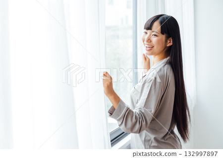 The well-being-conscious lifestyle of a young woman: A refreshing morning awakening The well-being-conscious lifestyle of a young woman: A refreshing morning awakening 132997897