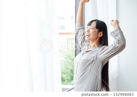 The well-being-conscious lifestyle of a young woman: A refreshing morning awakening The well-being-conscious lifestyle of a young woman: A refreshing morning awakening 132998063
