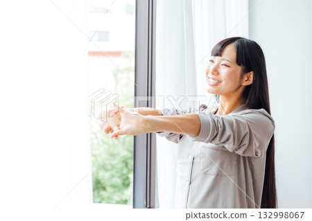 The well-being-conscious lifestyle of a young woman: A refreshing morning awakening The well-being-conscious lifestyle of a young woman: A refreshing morning awakening 132998067