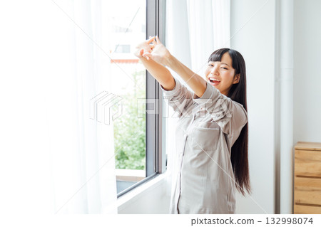 The well-being-conscious lifestyle of a young woman: A refreshing morning awakening The well-being-conscious lifestyle of a young woman: A refreshing morning awakening 132998074