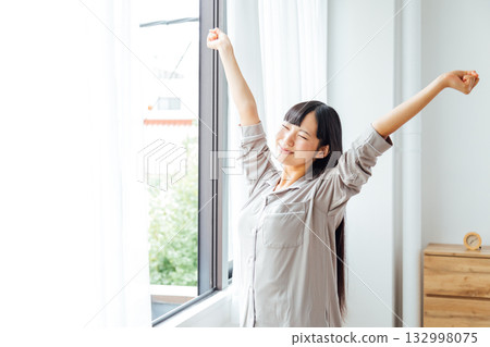 The well-being-conscious lifestyle of a young woman: A refreshing morning awakening The well-being-conscious lifestyle of a young woman: A refreshing morning awakening 132998075