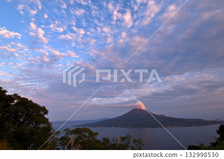 View of Sakurajima with smoke rising from the volcano near Sugiyama Park in Kagoshima 132998530