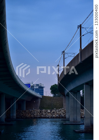 The seascape from the waterfront in Tung Chung, Hong Kong at sunset. Travel and nature scene. 133000400