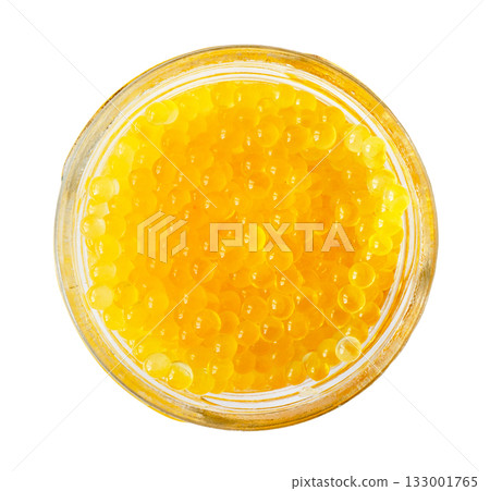 top view of yellow caviar of trout in can cut out top view of yellow caviar of trout in can cut out 133001765