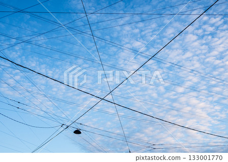 electrical wires and cables on street and blue sky electrical wires and cables on street and blue sky 133001770