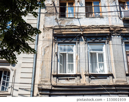 shabby facade of urban house in Sololaki, Tbilisi 133001939