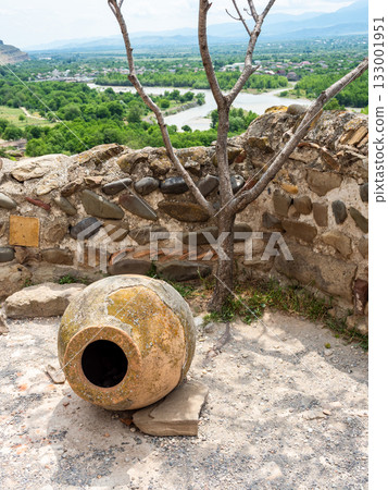 amphora (kvevri) for wine and view of Kura river amphora (kvevri) for wine and view of Kura river 133001951