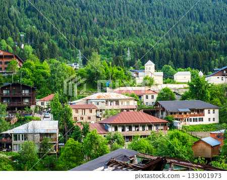 houses on green mountain slope in Mestia town houses on green mountain slope in Mestia town 133001973