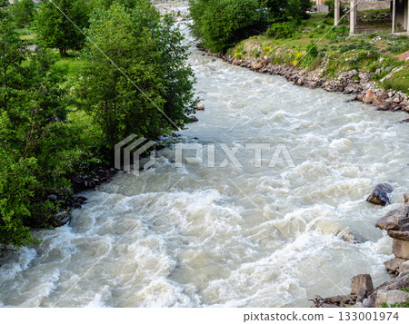 water flow of mountain river Mulkhra, Mestia town 133001974