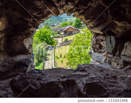 view old cemetery in Mestia town from arch window 133001996